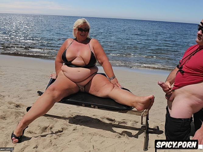 bikini, beach, sunglasses, fat thighs, blonde gilf, woman is giving a man a handjob