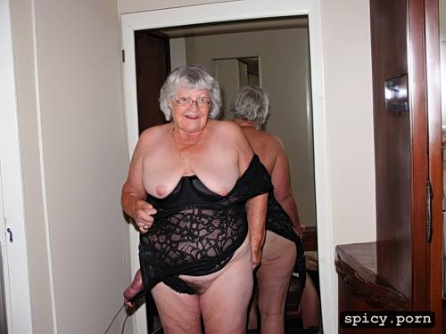 naked granny with big saggy tits, photographed from below, very hairy pussy