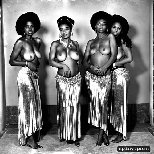 posing seductively, two caucasian women, two black women, three arabic women