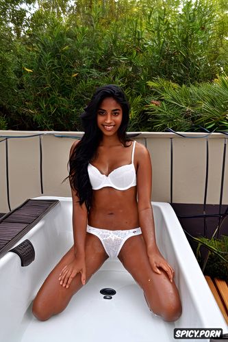 public pool area, dark, solo shy indian teen, cute, sitting in steamy outdoor hot tub