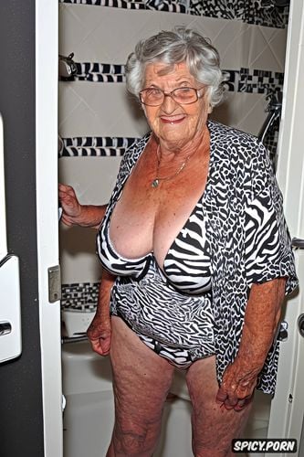 american granny ninety something friendly granny, looking at viewer smiling zebra print lingerie standing and revealing flashing tits silk robe platform mules in bathroom exhibitionist granny she shows off for young stud who is looking in through keyhole of bathroom door open robe