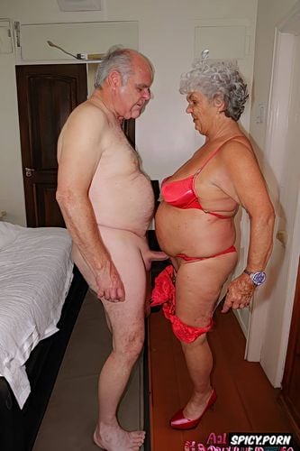 brunette, making eye contact, older adult man stands near, watching the sexy posing granny