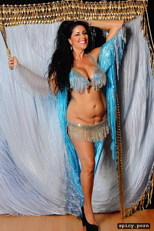 performing in high heels on stage, very beautiful bellydance costume with matching bikini top