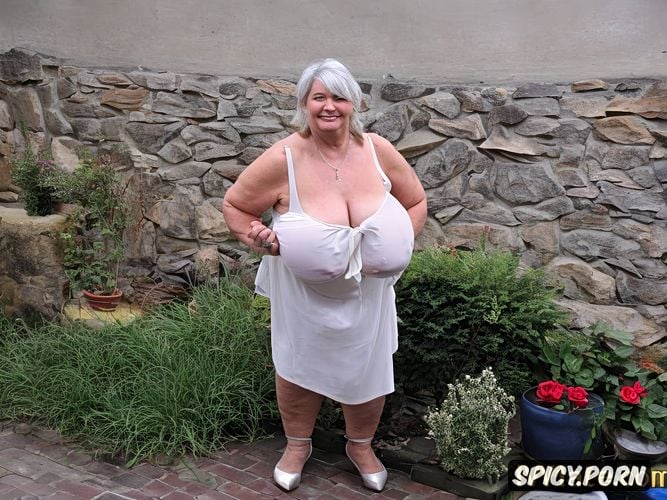 big breasts naked to the viewer, fat old woman dressed seen in full body showing her well detailed obese body