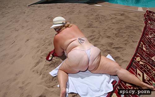 pulling bikini bottom aside, suntanning, full body, white obese 55 year old milf