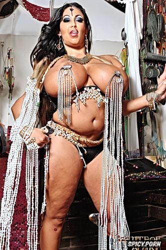 beautiful curvy body, symmetric torso, belly dance studio, gold and silver and pearls jewelry and color beads
