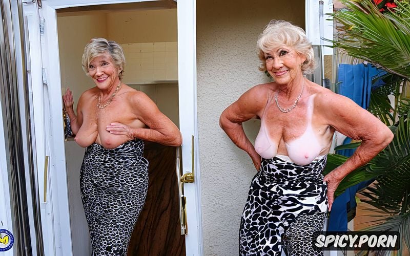 shaved pussy, beautiful fitness granny, fake tan, gilf, standing in bedroom in sexy slide mules doing striptease for me intense eye contact wrinkled body