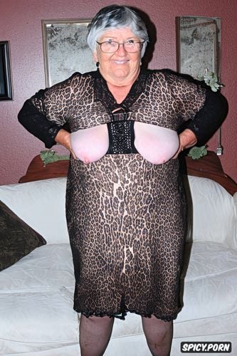 very old irish granny, huge saggy tits, enormous dick, grannys robe is open