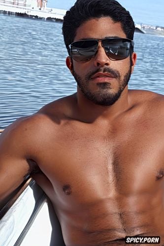 sexually masculine, close up on face, casual photo, relaxing in boat