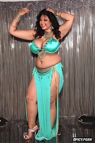 beautiful belly dance costume, performing on stage, long black wavy hair