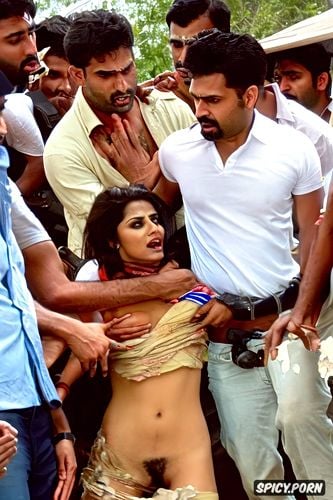 a mob of violent indian men surrounds a gujarati beauty during riots