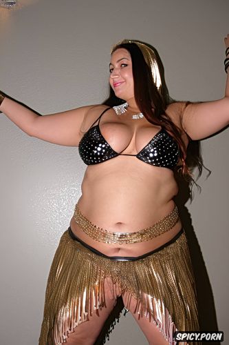 massive saggy melons, gold and silver and colorful jewelry, extremely long wavy dark hair