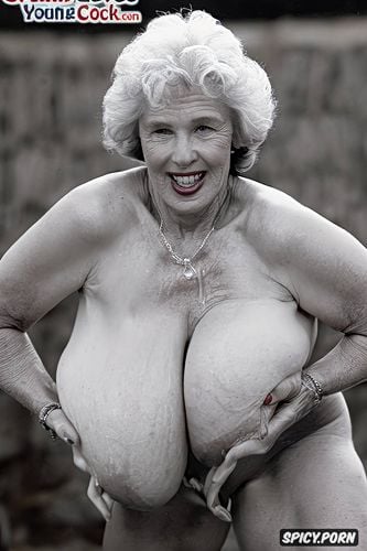 completely naked, eighty of age, ultra massive breasts, massive breast implants