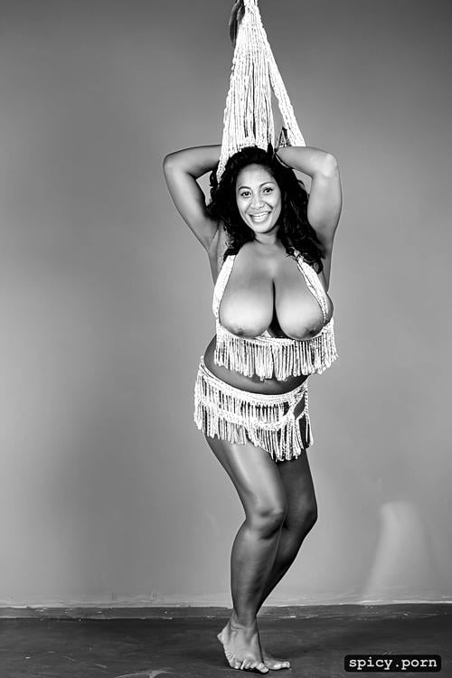 performing, beautiful smiling face, giant hanging boobs, 53 yo beautiful tahitian dancer