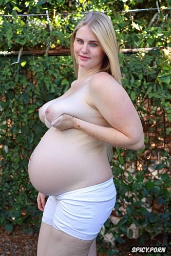 youngest teen face, large pregnant belly, wearing gym shorts and topless