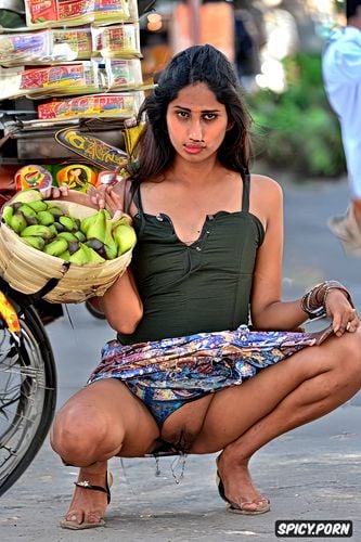 a young south asian female hottie, a small street vendor in vadodara