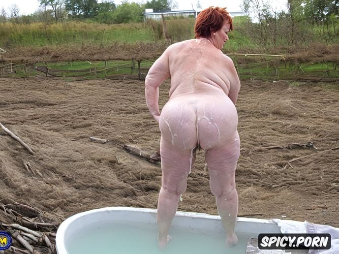 closeup, in filthy piss filled bathtub, naked obese bbw granny