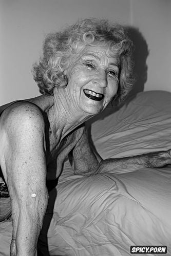 spreading legs wide in bedroom, very very very very old old old old year old say old lady smiling short curly white hair lots of lines and wrinkles in face