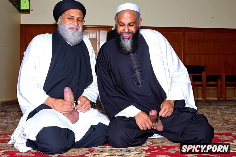 cloak, carpets on floor, two old muslim imams, kneeling, mosque