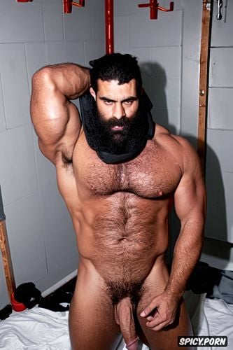 he is lying nude on the floor of a prison cell, erect dick and huge balls