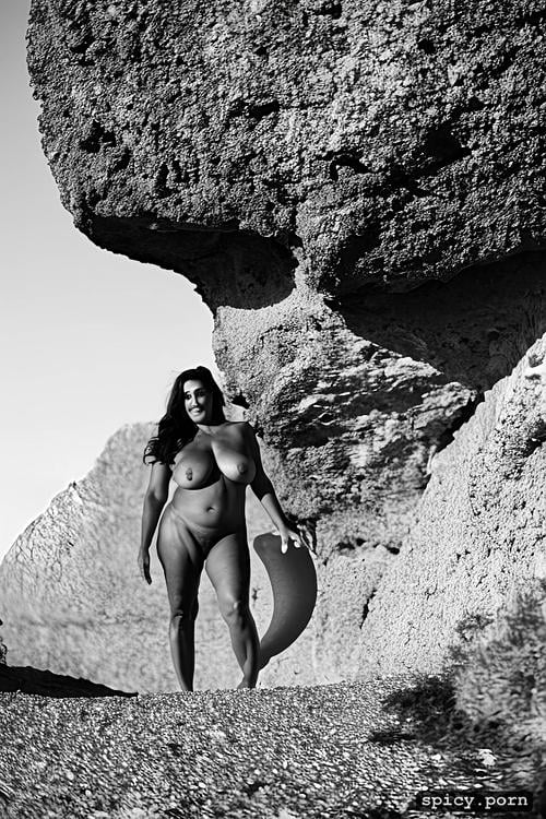 giant natural boobs, half view, 46 yo, rocky algarve beach, voluptuous spanish model