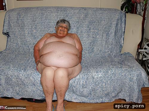 very hairy fat gaping vagina, sitting on couch, 90 y o, fat loose arms