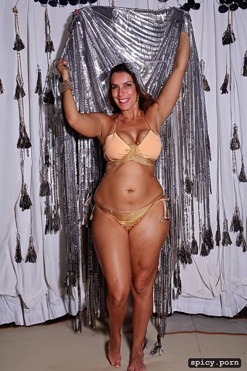 performing on stage, 51 yo very beautiful bellydancer, wide hips