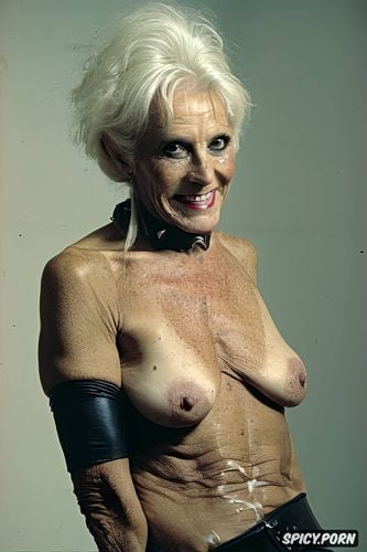 skinny, tanned, old witch, leathery skin, big fake tits, smiling