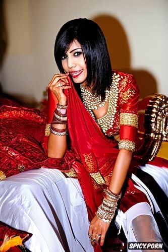 sitting in bed, honeymoon, traditional red wedding saree blouse and petticoat