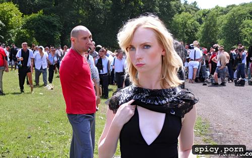 conservatively dressed pale skinned respectable woman shirt pulled from behind in public by a group of barbaric men