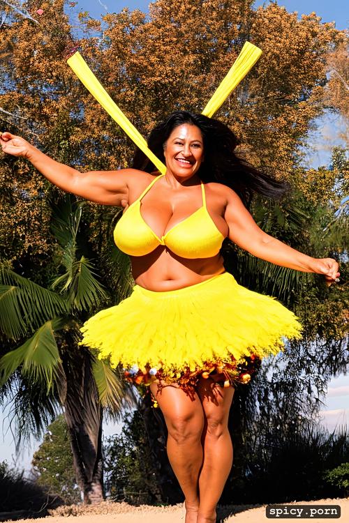 72 yo beautiful hawaiian hula dancer, color portrait, performing on stage