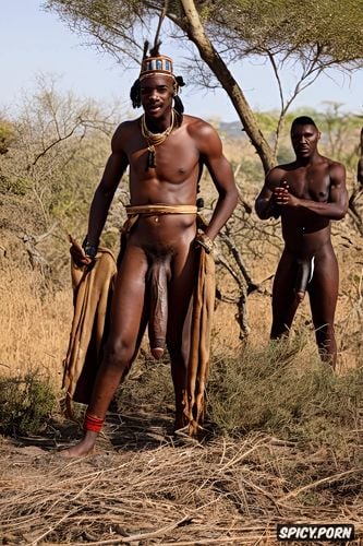 a white man gay explorer dressed as a hunter without pants, being fucked by two africans with a huge dick