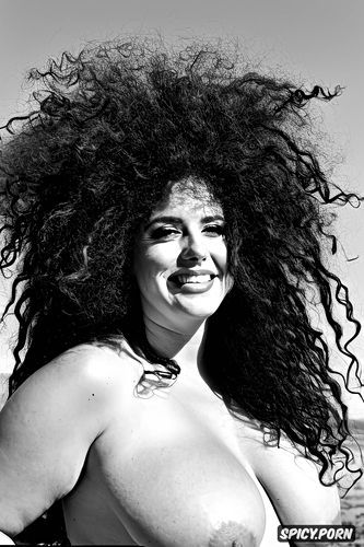 topless, smiling, in desert, gorgeous white supermodel, long curly hair