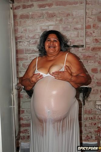 visible pussy, thick, she smile, flabby loose belly skin, wearing a wet sleeveless loose coton light grey night gown