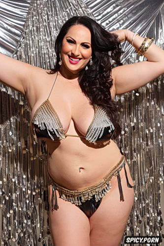 wide hips, huge hanging hooters, gold and silver and colorful jewelry