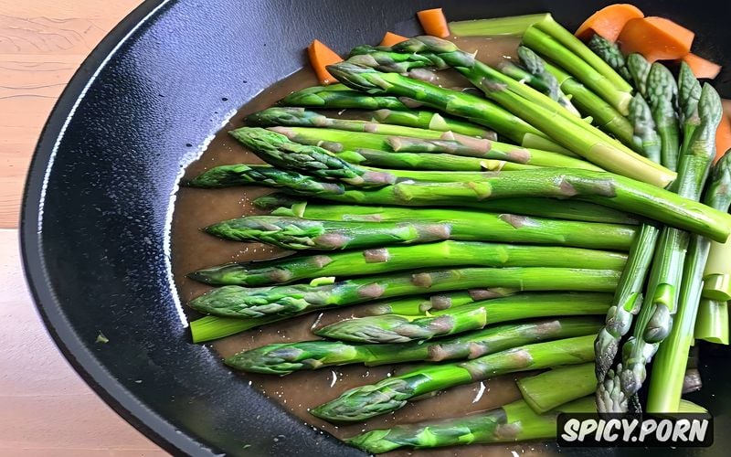 fresh spinach, asparagus with butter and salt in a skillet, leeks and carrots