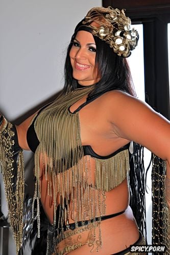 gorgeous voluptuous belly dancer, smiling, huge natural boobs traditional piece belly dance costume